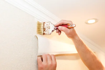 Pose de papier peint à Leucamp — revêtements muraux et toiles de verre